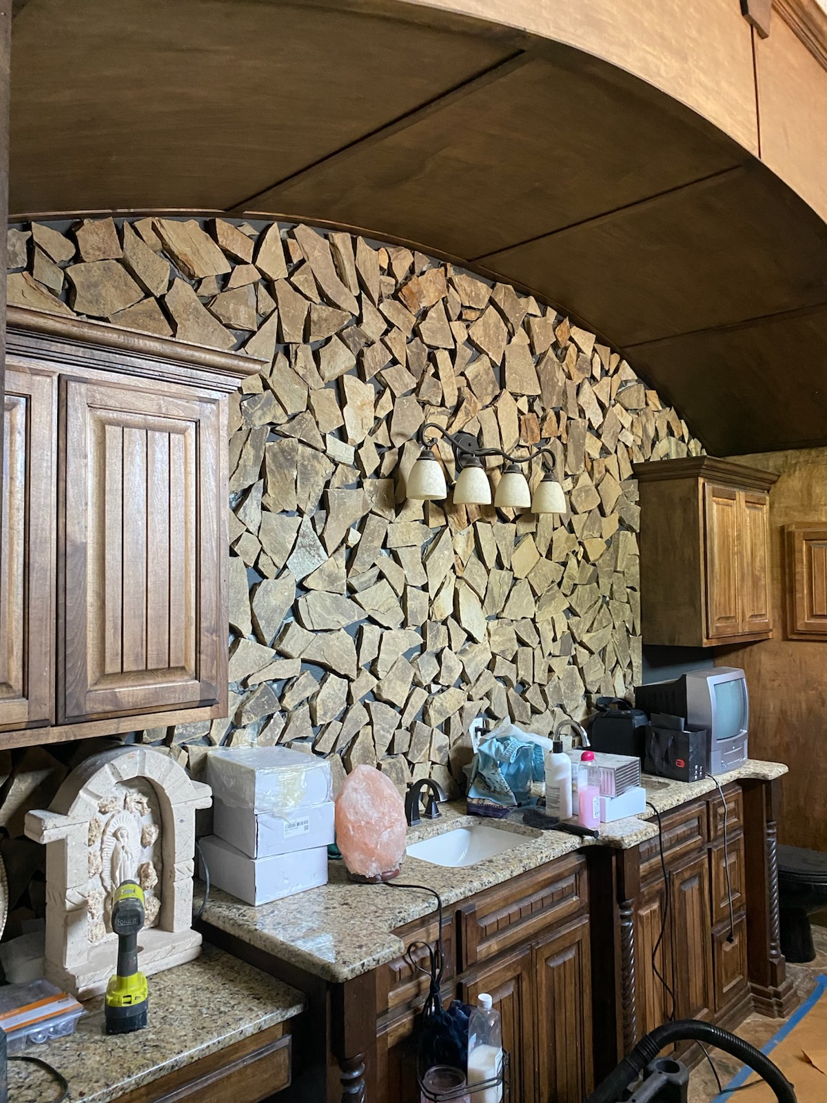 Bathroom vanity stone wall detail